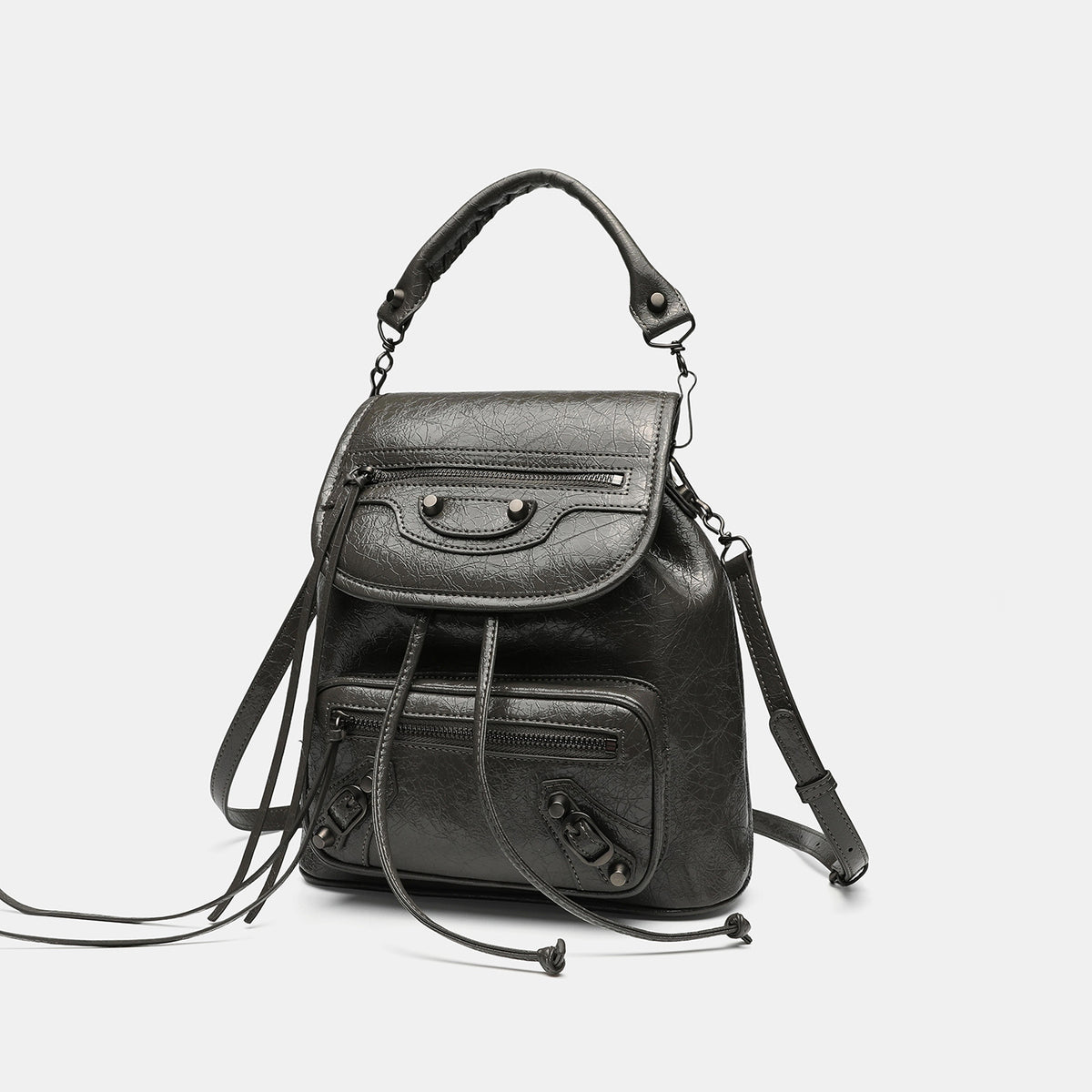 Small structured glossy leather-look convertible backpack handbag in black with flap closure, front zip pockets, metal stud
