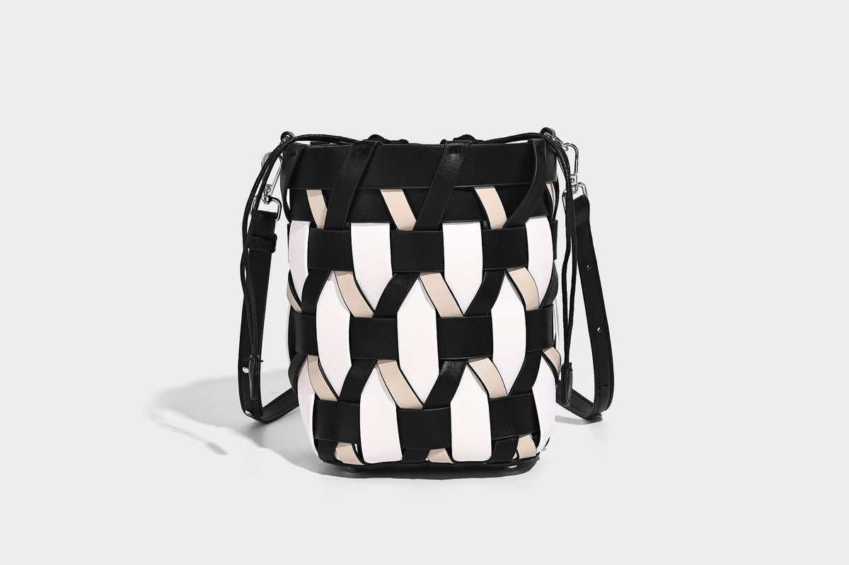 Small woven lattice bucket bag in tan and cream leather-look strips with drawstring top and detachable crossbody strap