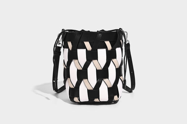 Small woven lattice bucket bag in tan and cream leather-look strips with drawstring top and detachable crossbody strap
