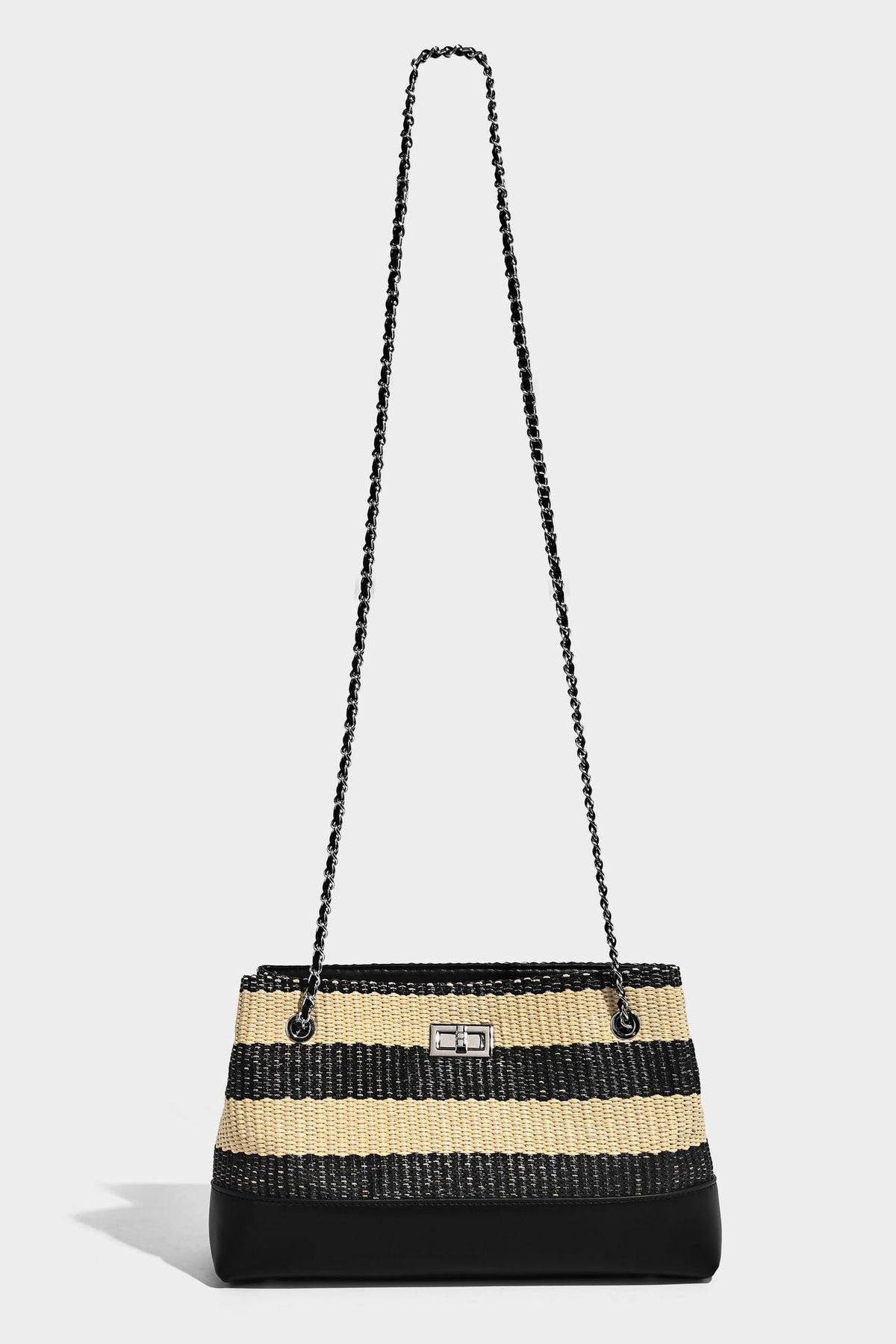 Structured black and beige striped woven shoulder bag with silver chain strap and turn-lock metal clasp, detail view 17