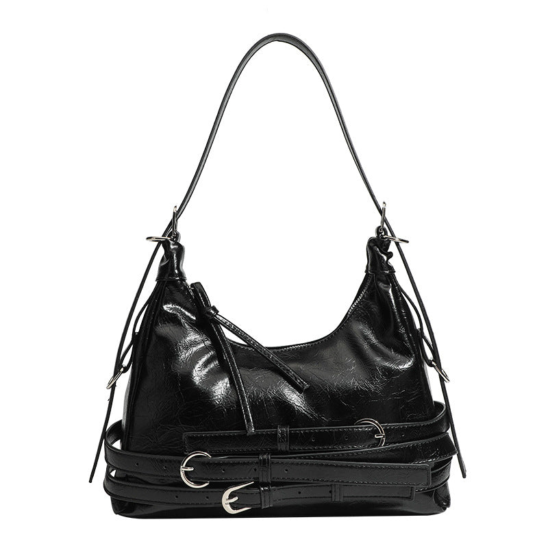 Slouchy hobo shoulder bag in glossy crinkled leather-look finish with silver-tone buckle hardware and slim adjustable strap