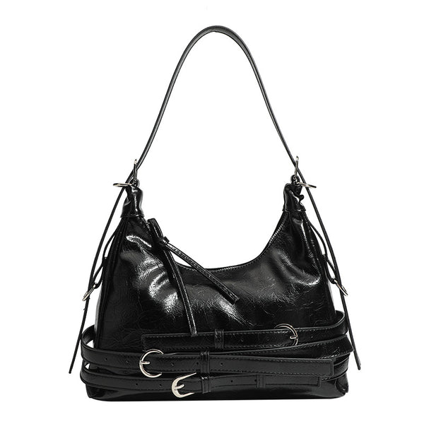 Slouchy hobo shoulder bag in glossy crinkled leather-look finish with silver-tone buckle hardware and slim adjustable strap