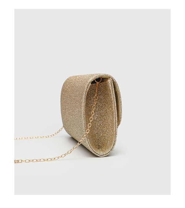 Structured glitter envelope clutch bag with gold-tone V-bar hardware and detachable chain strap, detail view 11