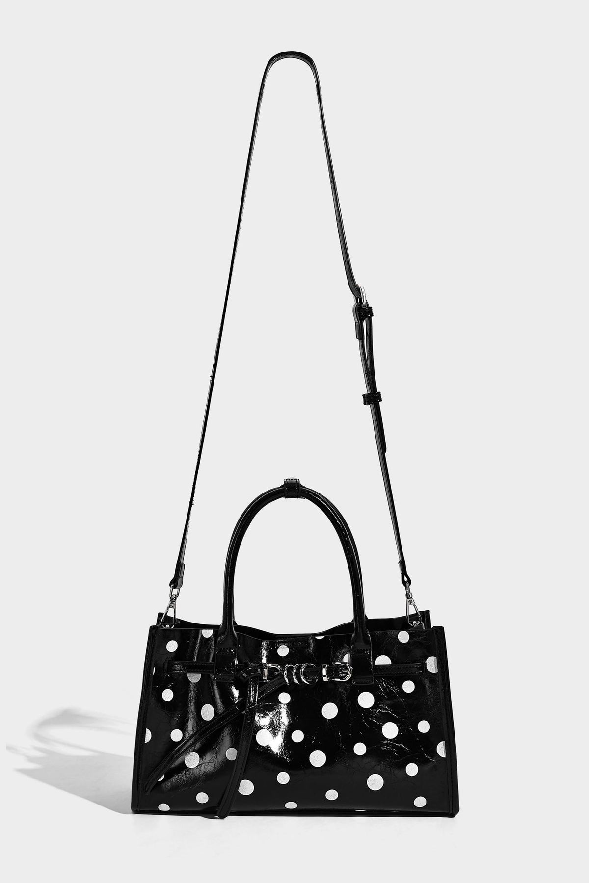 Structured glossy leather-look polka-dot satchel tote with dual top handles and detachable shoulder strap, detail view 15