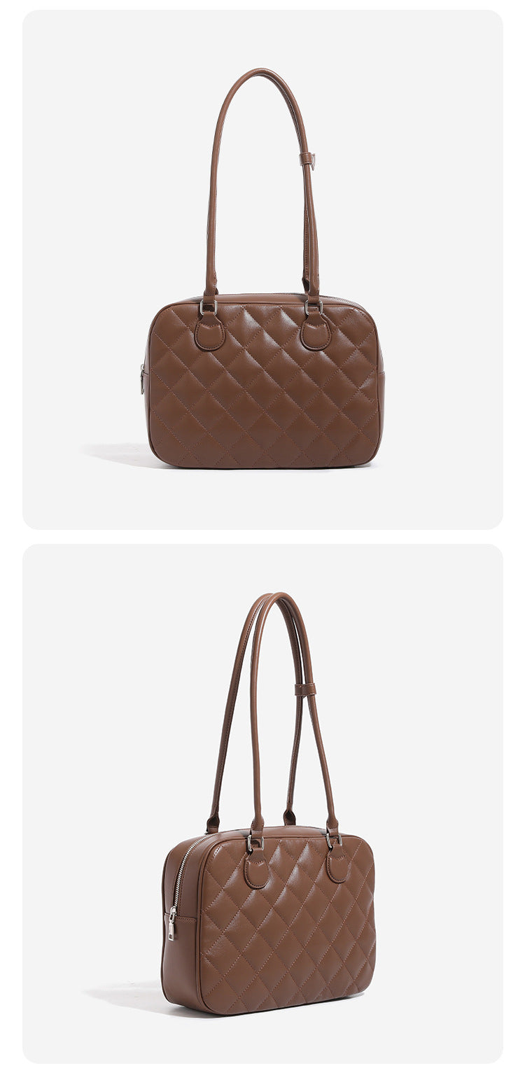 Structured diamond-quilted bowling shoulder bag with silver-tone hardware and top zip closure, detail view 12