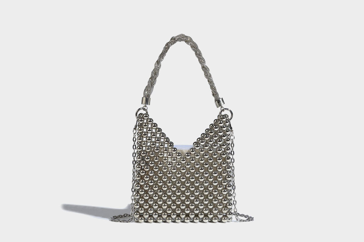 Small silver metallic beaded mini bag with braided rhinestone top handle and detachable chain crossbody strap, detail view 24