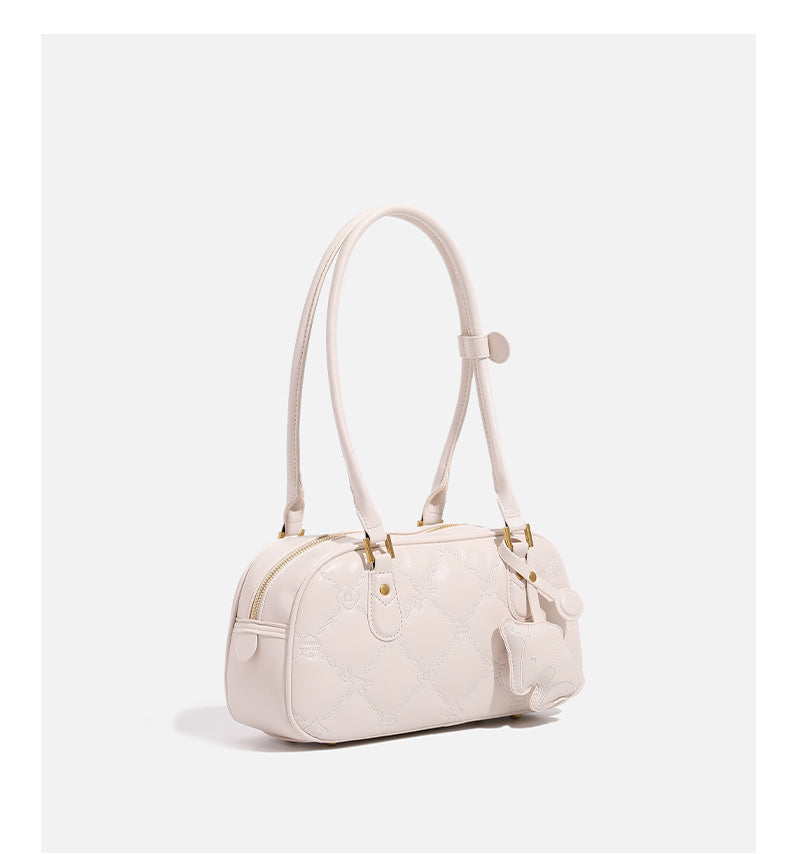 Small structured quilted leather-look zip shoulder bag with gold-tone hardware and adjustable strap, detail view 14
