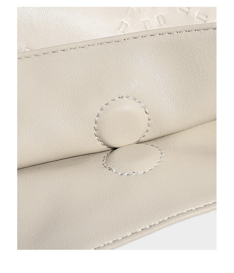 Große Tote-Schultertasche aus geprägtem Lederimitat in Elfenbein-Creme mit zwei langen Riemen, seitlicher Kordelraffung und abnehmbarem