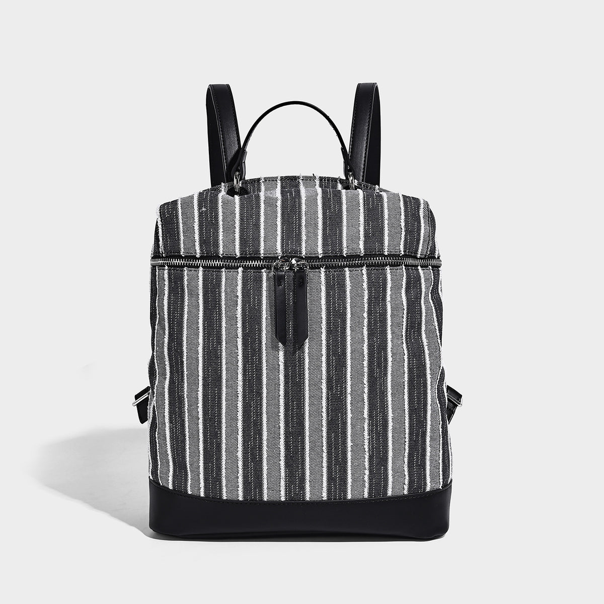 Small structured striped fabric backpack handbag with cream leather-look trim, top handle, and silver-tone hardware, detail