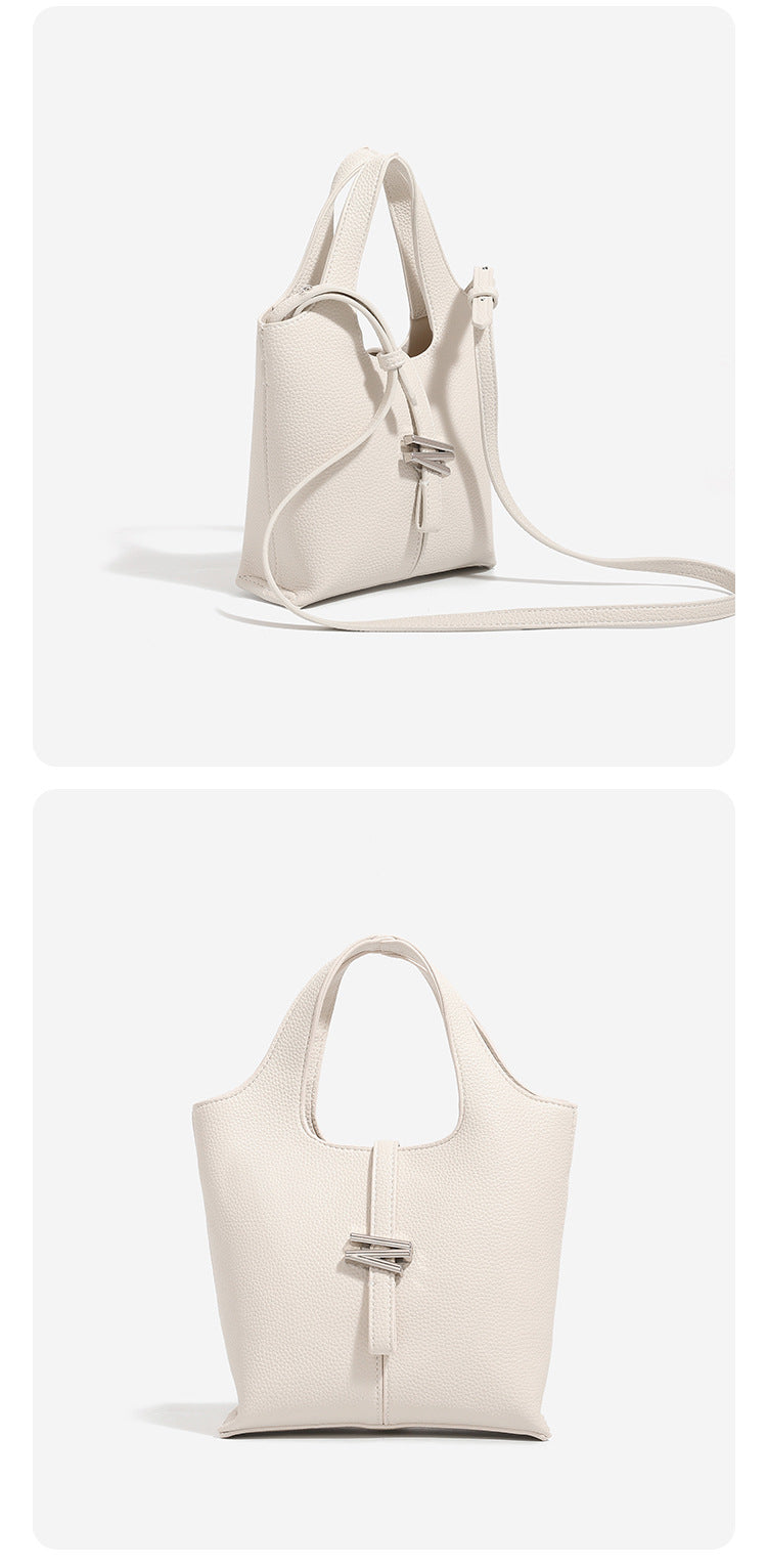 Mini pebbled leather-look bucket tote with silver toggle clasp and dual top handles, detail view 14
