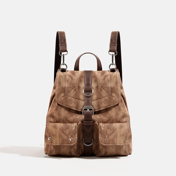 Compact distressed leather-look tan-brown backpack handbag with flap-and-buckle closure, two front patch pockets, top handle