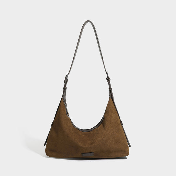 Weiche Hobo-Schultertasche in matter brauner Velourslederoptik mit dunklen glatten Besätzen, Reißverschluss oben und langem verstellbarem
