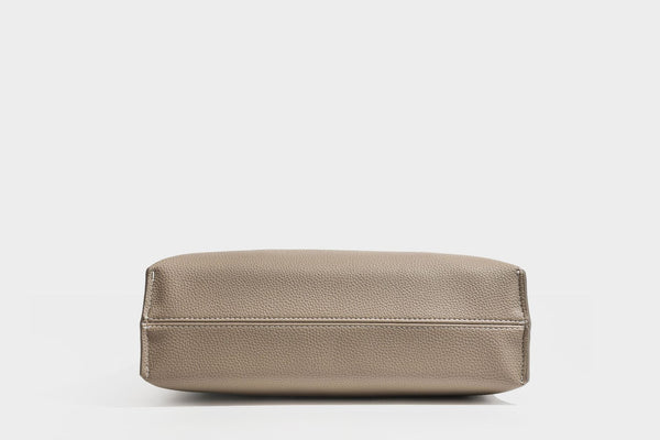 Pebbled leather-look tote bag with front toggle hardware and long shoulder strap, detail view 26