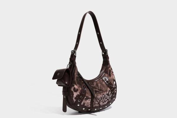 Crescent-Hobo-Schultertasche mit braunem Leopardenmuster, silbernen Nieten, Ösenbesatz, verstellbarem Riemen und abnehmbarem Mini