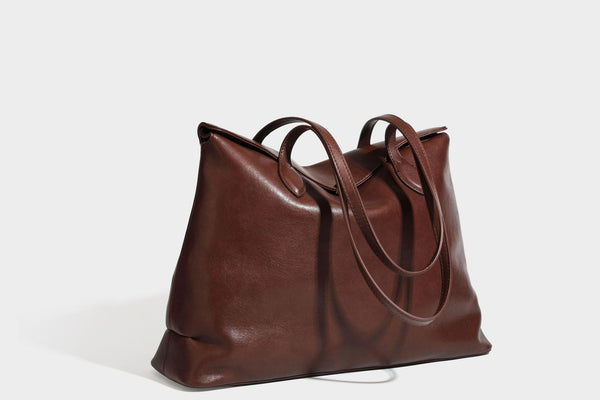 Large leather-look tote shoulder bag with slim double straps and silver-tone turn-lock closure, detail view 34