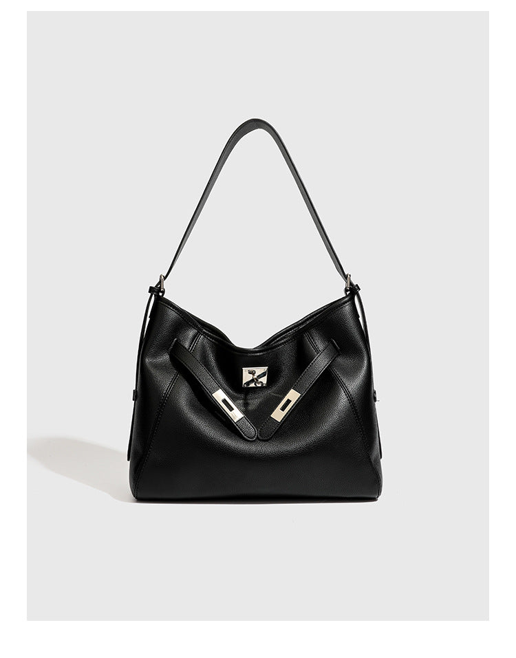 Large black pebbled leather-look hobo shoulder bag with silver-tone turn-lock front hardware and single flat adjustable