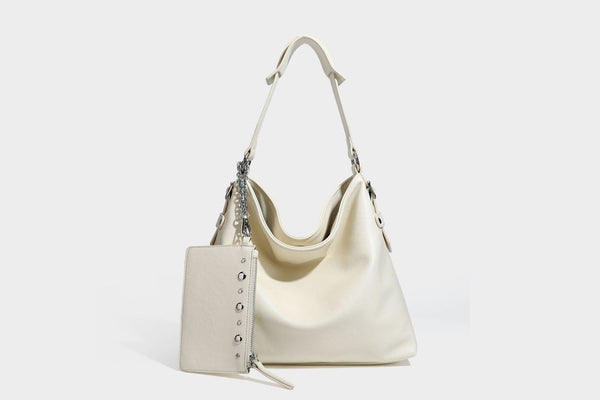 Large slouchy hobo shoulder bag in dark brown with smooth leather-look finish, adjustable strap, and silver-tone hardware