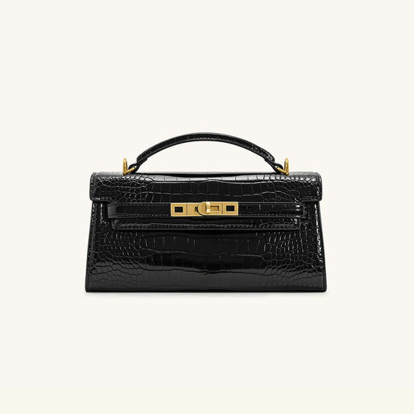 Strukturierte rechteckige Satchel-Tasche mit Krokodilprägung, goldfarbenem Drehverschluss und kurzem Henkel, Detailansicht 6