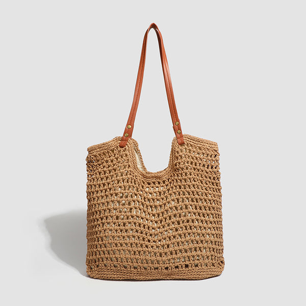 Open-knit woven tote bag with leather-look shoulder straps and brass-tone hardware in off-white, detail view 9