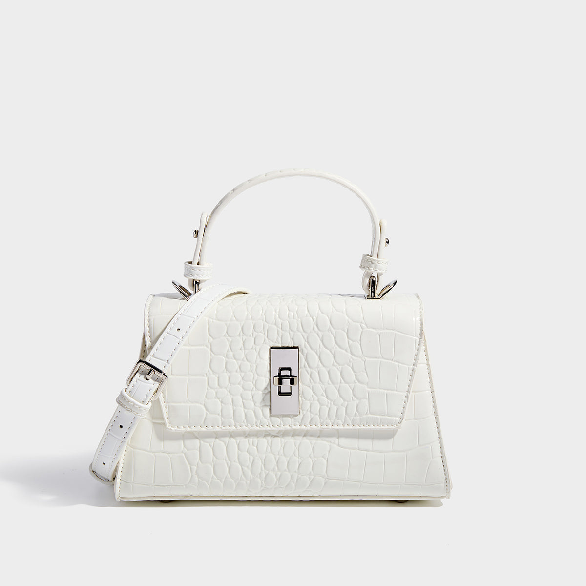 Small structured crocodile-embossed glossy top-handle satchel bag with silver-tone turn-lock clasp and detachable shoulder