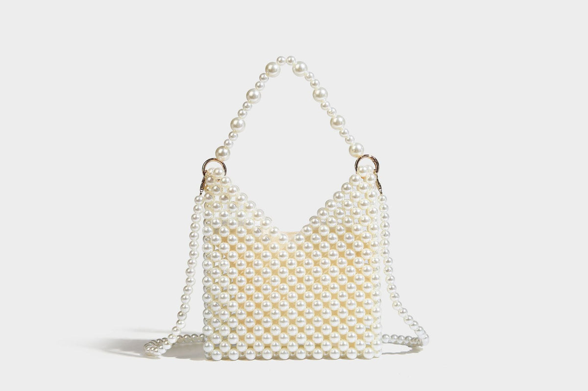 Small silver metallic beaded mini bag with braided rhinestone top handle and detachable chain crossbody strap, detail view 26