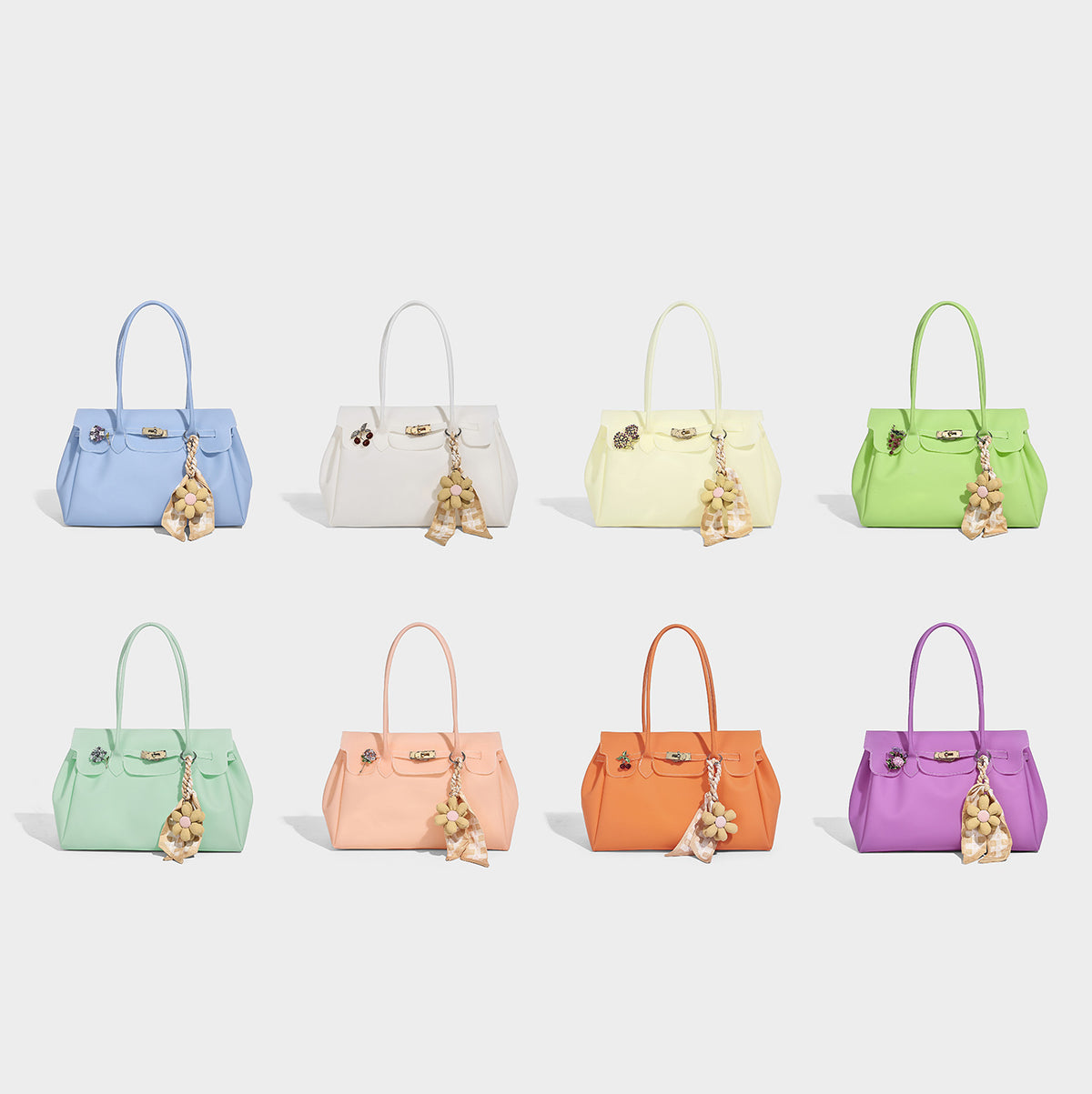 Structured matte jelly tote bag with gold-tone turn-lock flap closure, double shoulder handles, side gussets, and decorative