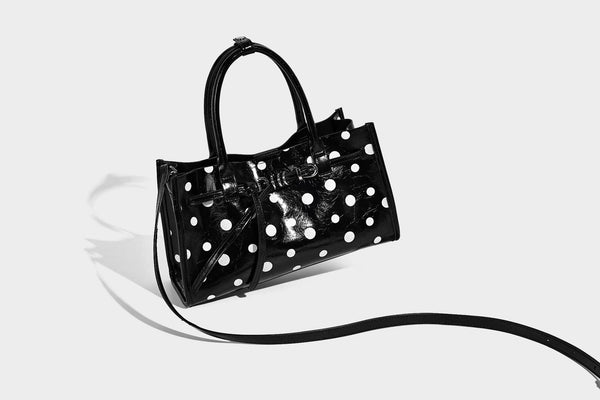 Structured glossy leather-look polka-dot satchel tote with dual top handles and detachable shoulder strap, detail view 14