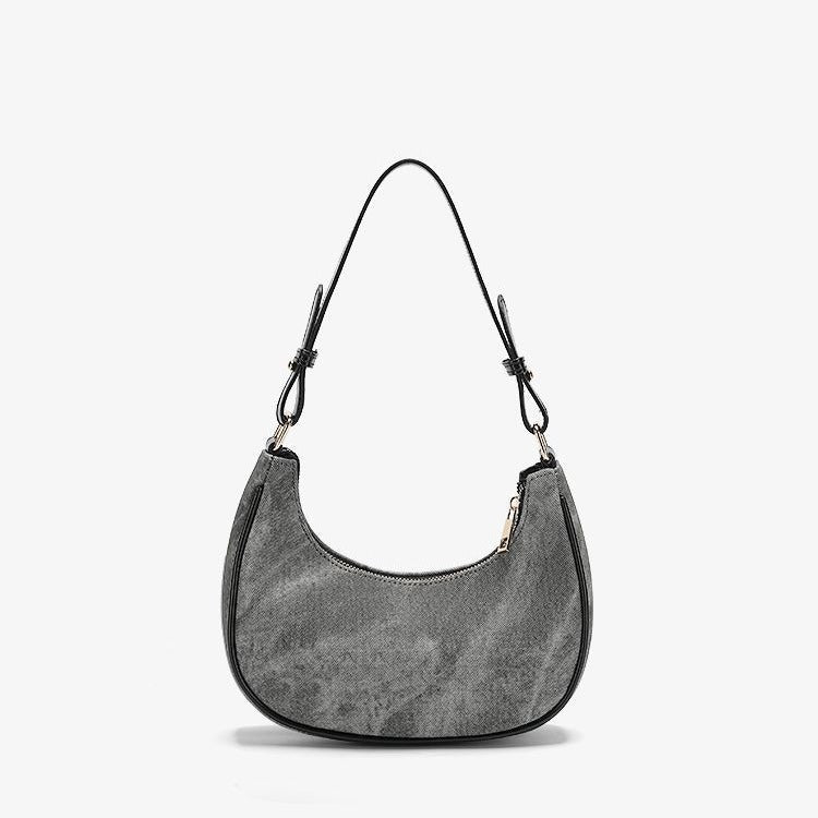 Small gray crescent half-moon shoulder bag with black leather-look trim, gold-tone zipper, and adjustable slim strap, front