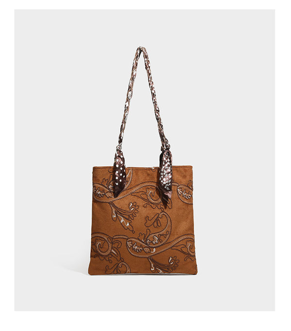 Brown suede-finish tote bag with paisley embroidery and braided fabric-ribbon shoulder strap, detail view 31