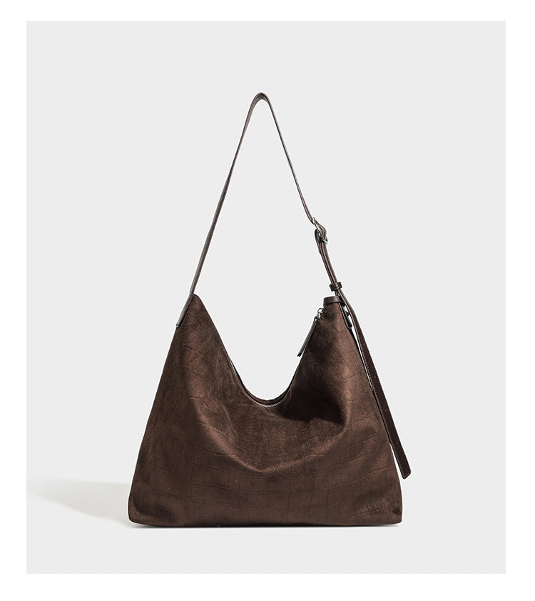 Slouchy croc-embossed matte hobo shoulder bag with adjustable strap and top zip closure, detail view 11