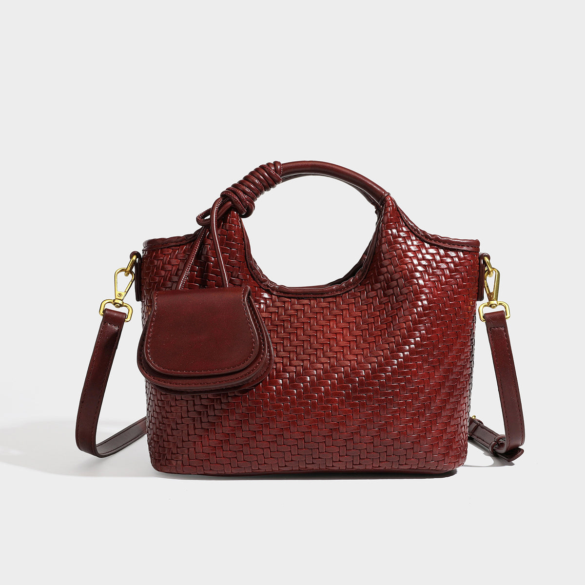 Woven leather-look tote bag in mocha brown with knotted top handle, front flap pocket, and detachable crossbody strap with