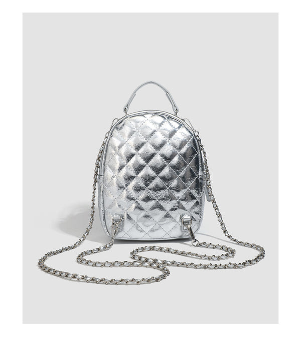 Quilted leather-look backpack purse with chain strap and turn-lock front pocket, detail view 15