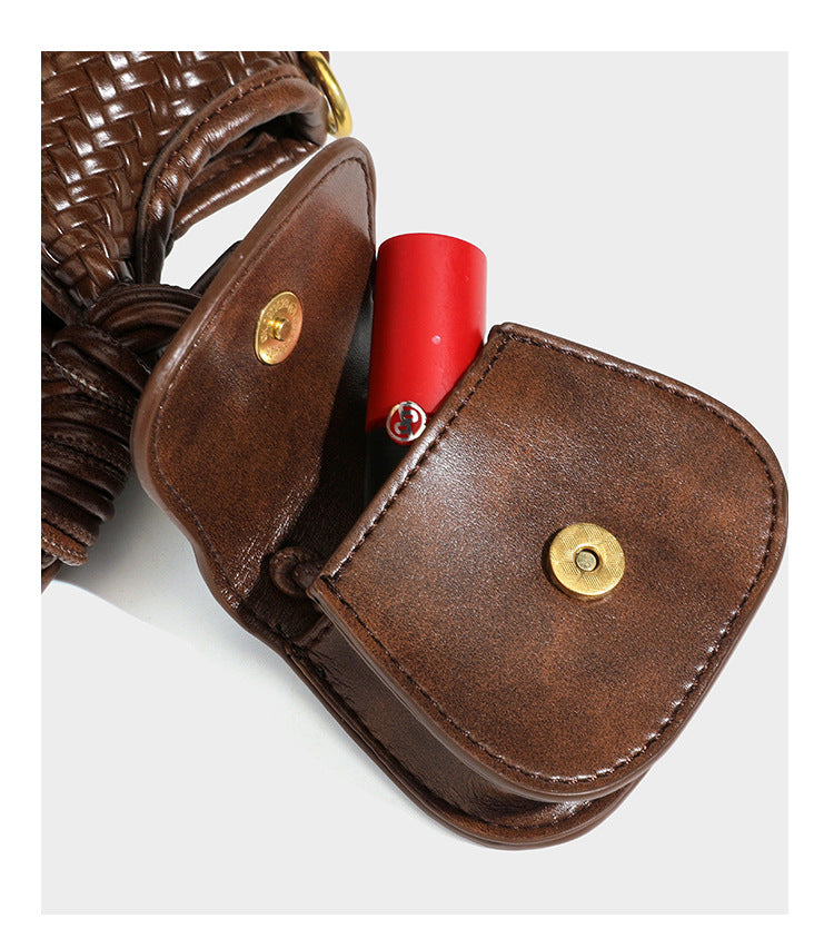 Woven leather-look tote bag in mocha brown with knotted top handle, front flap pocket, and detachable crossbody strap with