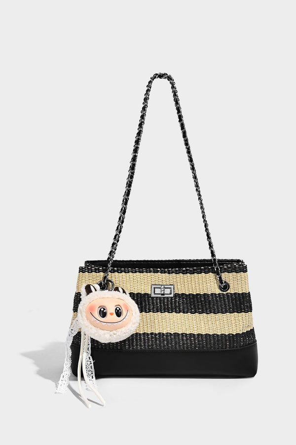 Structured black and beige striped woven shoulder bag with silver chain strap and turn-lock metal clasp, detail view 12