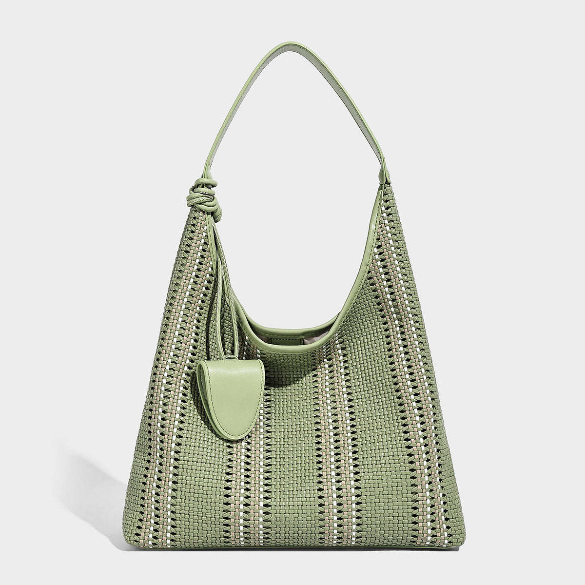 Woven striped slouch shoulder tote bag with knotted strap and attached front flap pouch, detail view 3