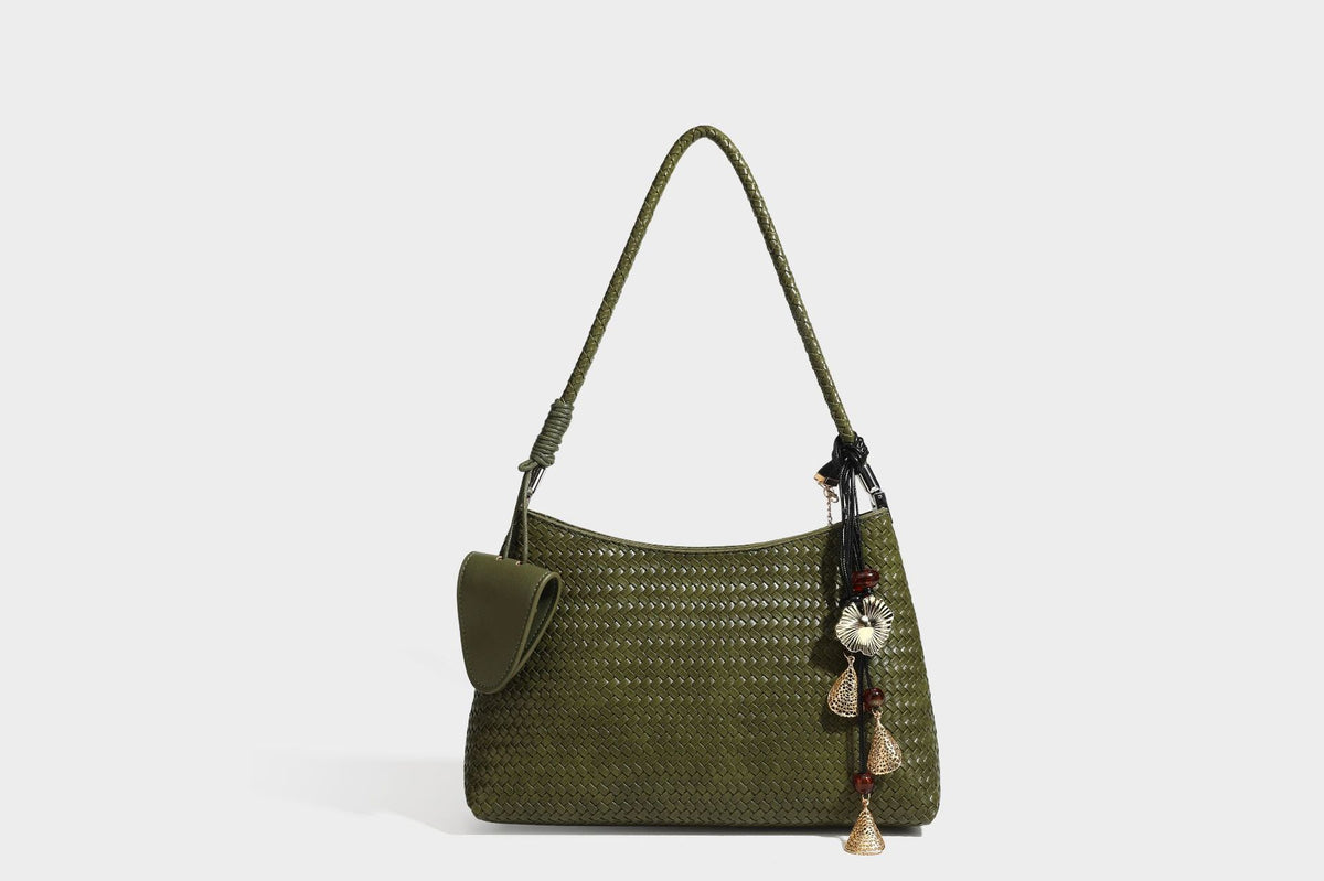 Woven-texture hobo shoulder bag in brown with braided top handle, adjustable crossbody strap, front flap pocket, and, detail