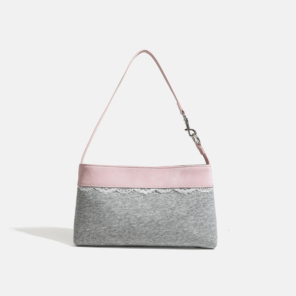Compact gray textile shoulder bag with lace trim and smooth leather-look strap, front view