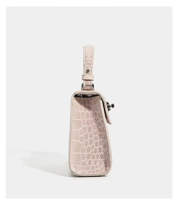 Croc-embossed mini top-handle satchel with silver turn-lock closure and adjustable crossbody strap, detail view 22