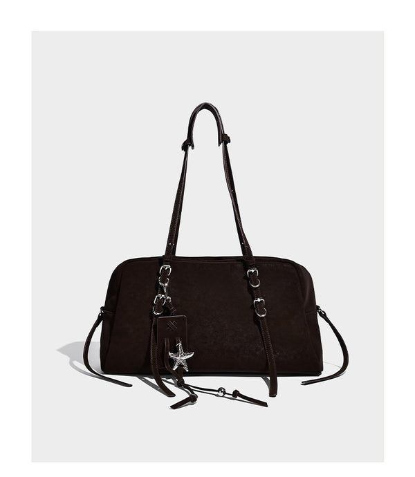 Structured rectangular matte suede-like shoulder bag with silver-tone hardware, zip closure, double top handles, and, detail