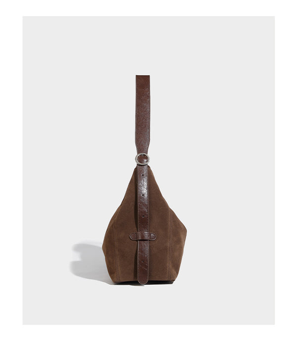 Slouchy hobo shoulder bag with turn-lock flap closure and adjustable strap, detail view 13