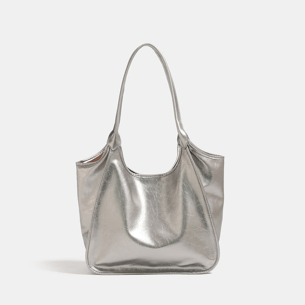 Large open-top shoulder tote bag with glossy crinkled metallic finish and long double straps, detail view 6