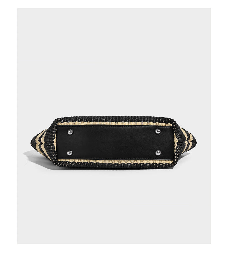 Black and natural striped woven tote bag with chain shoulder strap and silver-tone turn-lock hardware, detail view 10