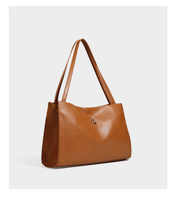 Structured rectangular shoulder tote bag with smooth leather-look finish, long double straps, and gold-tone gourd emblem on