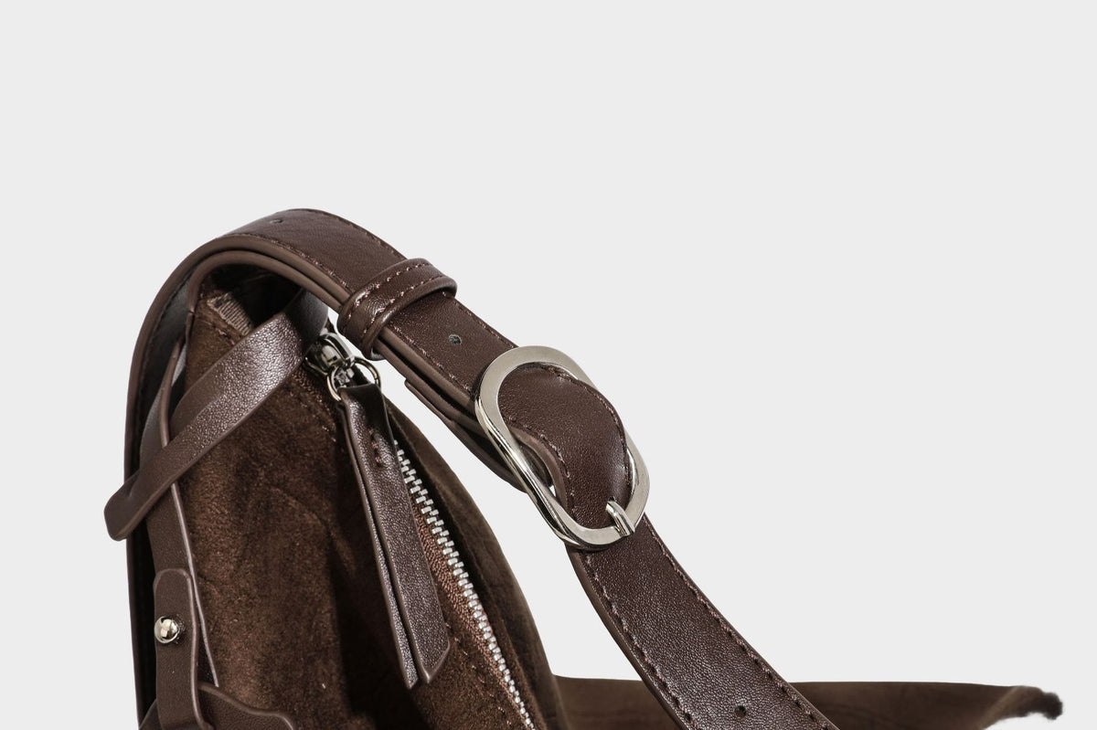 Slouchy hobo shoulder bag in matte croc-embossed leather-look finish with top zip closure and long adjustable strap, detail