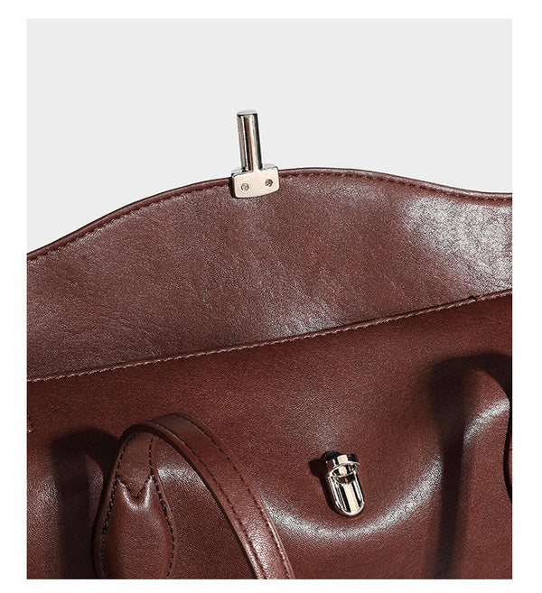 Large leather-look tote shoulder bag with slim double straps and silver-tone turn-lock closure, detail view 21