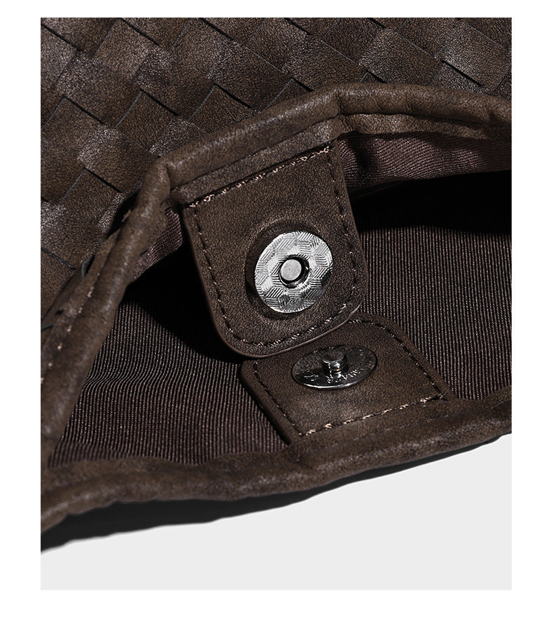 Slouchy woven hobo shoulder bag with knotted strap and matte leather-look textured finish, detail view 13