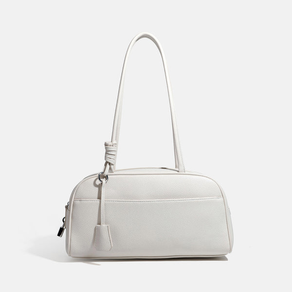 Structured rounded rectangular shoulder bag with pebbled leather-look finish, dual long handles, top zipper, front zip