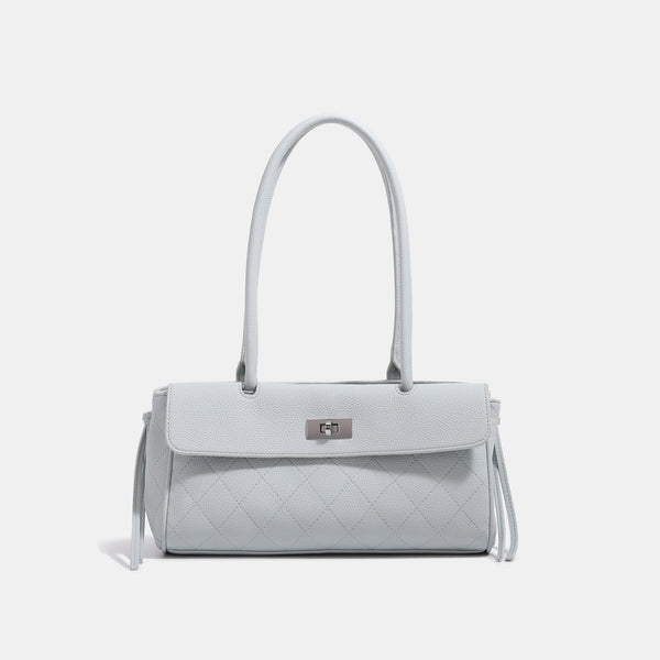 Structured quilted diamond-stitch baguette handbag with gold-tone turn-lock closure and dual top handles, detail view 8