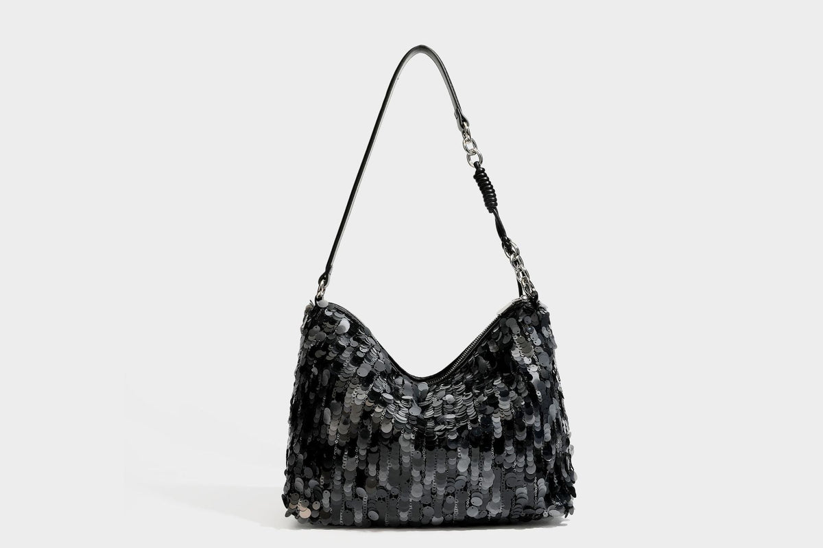 Slouchy paillette sequin hobo shoulder bag with zip closure and adjustable leather-look strap with silver chain hardware