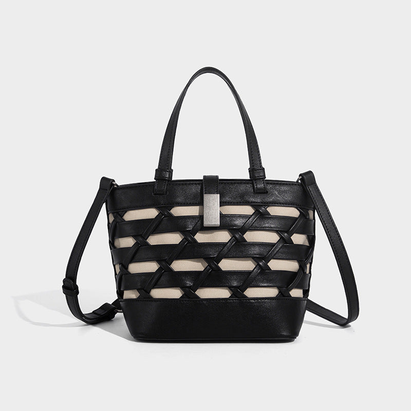 Structured woven lattice tote bag with cream lining, dual top handles, detachable crossbody strap, and silver-tone hardware